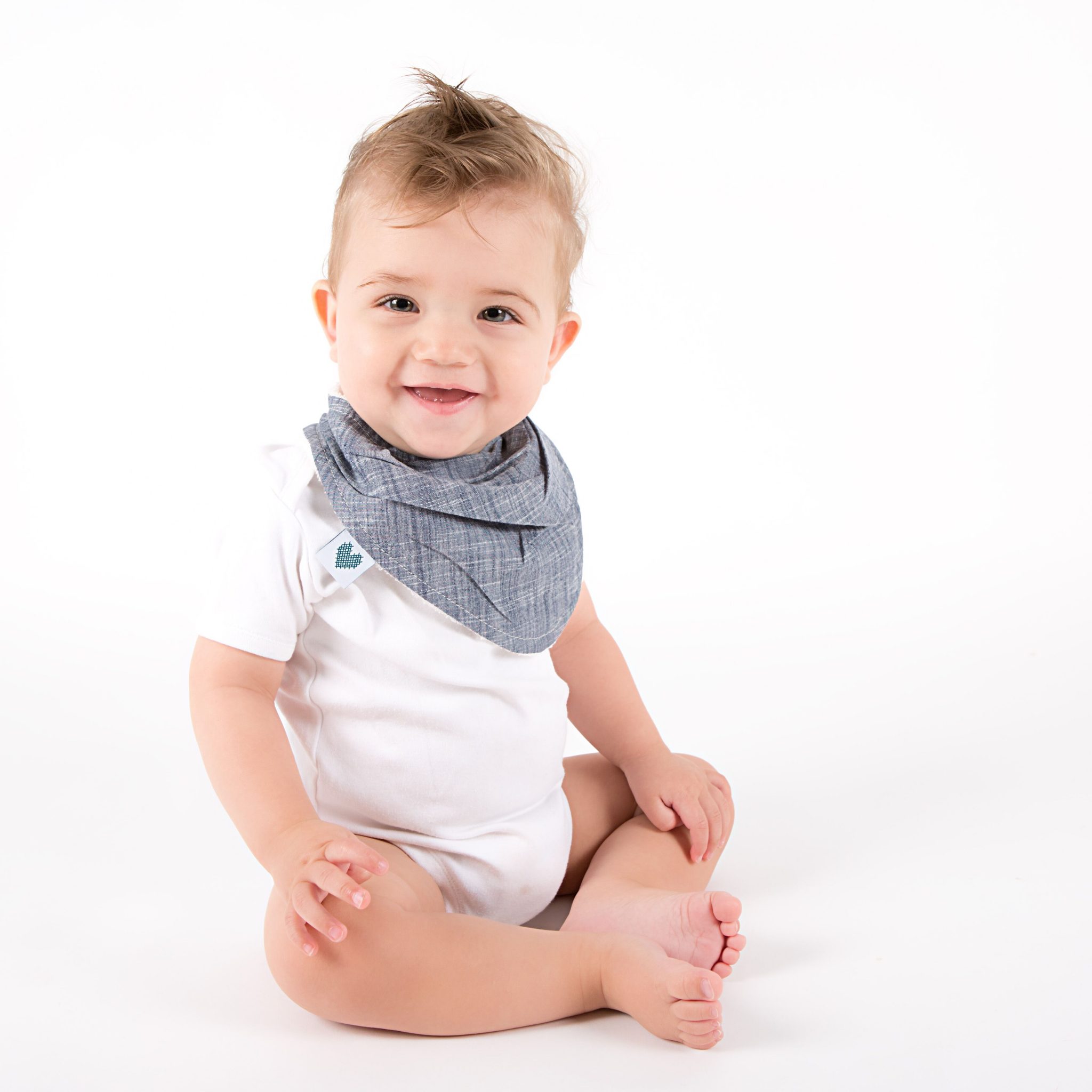 Boy wearing indigo colour baby bandana bib