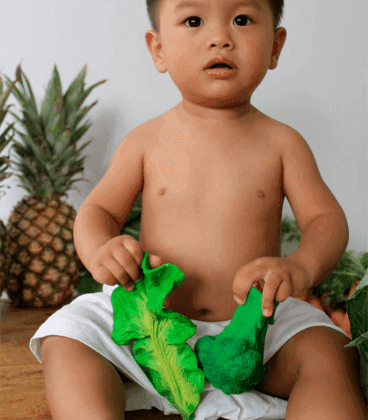 Baby with kendall the kale bath toy
