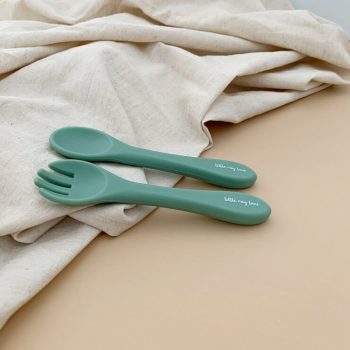 Cutlery in sage colour out of packaging
