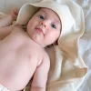baby in hooded towel