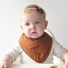 baby wearing autumn colour bib and bow