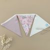 nursery bunting snugglepot dusty pink oatmeal spread out