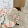 Bib and bow gift set peaches print left side